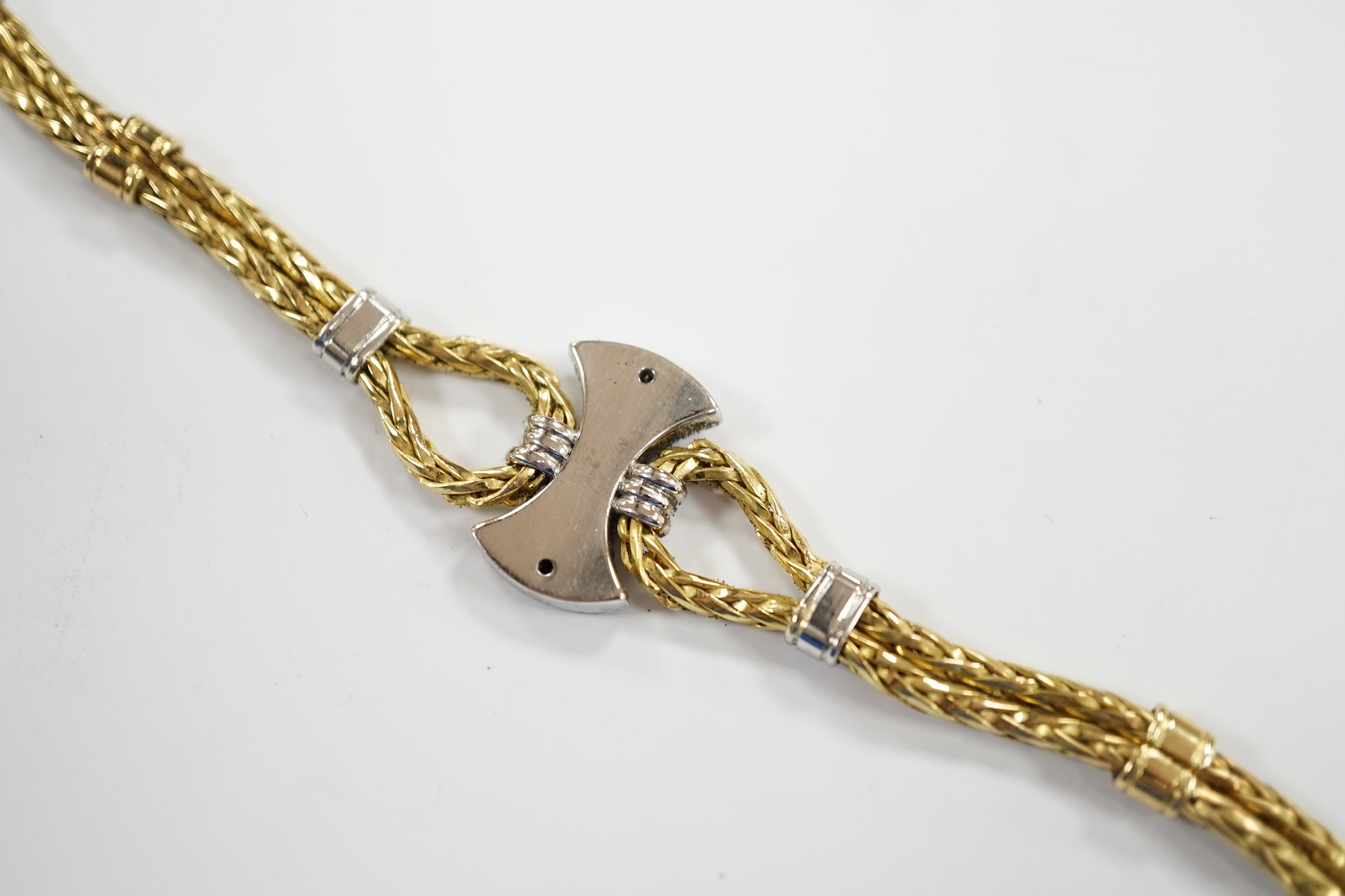 A modern 750 yellow metal and diamond cluster set bracelet, 21.5cm, gross weight 33.9 grams.
